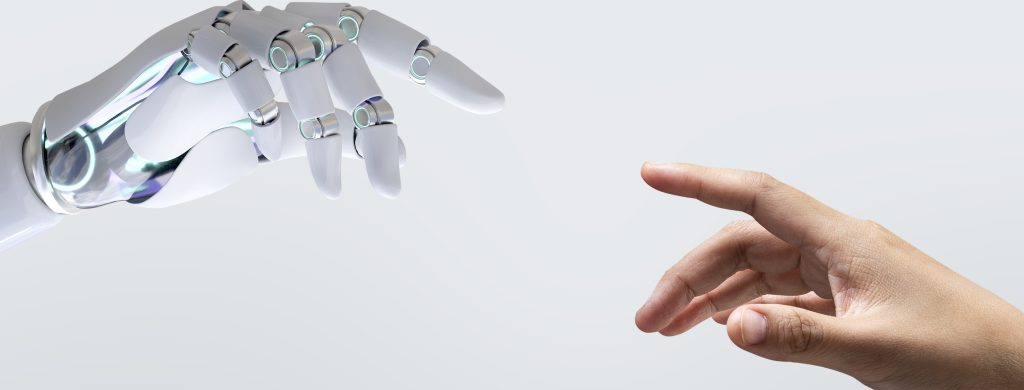 Uma mão mecanica quase tocando uma mão humana